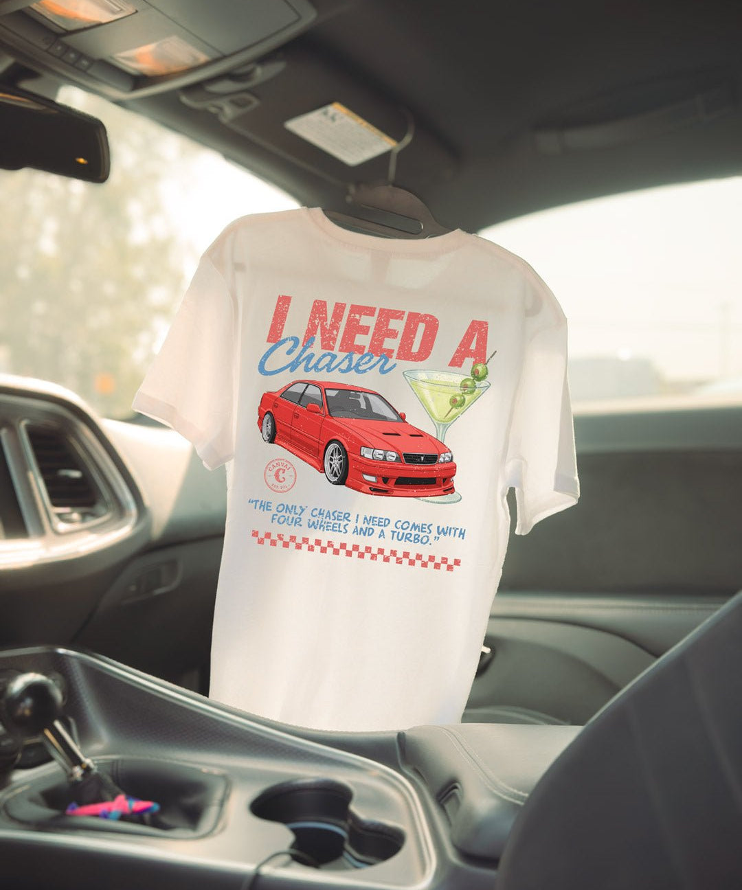 Drop Shoulder T-shirt "I Need A Chaser" in White - Canvai